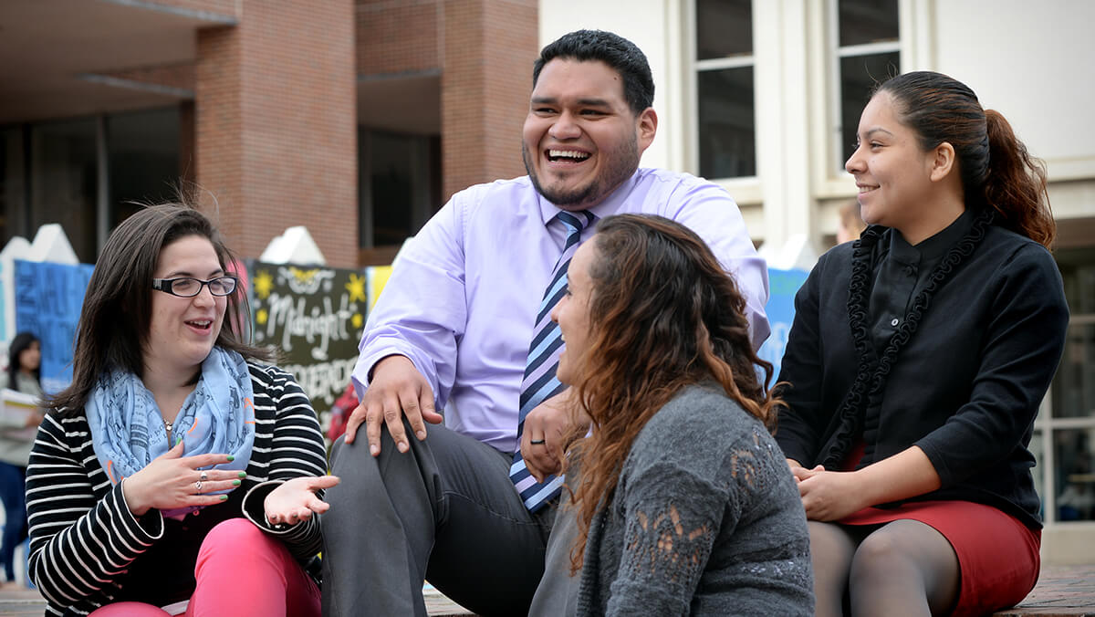 Natalie Borrego, Josmell Perez, Laura Gamo and Christina Villegas chat in the Pit