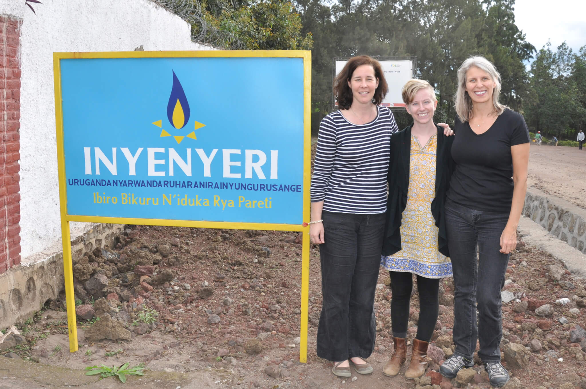 Carolina professors Pam Jagger and Leena Nylander-French, pose with 2011 graduate Megan Strickland (middle) in Rwanda.