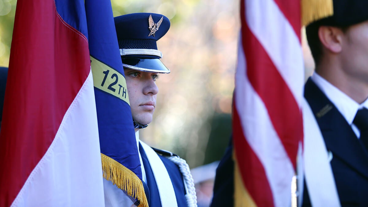 ROTC member stands at attention.