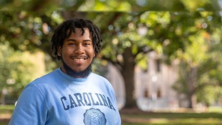 Danial Garcia standing on Polk Place.