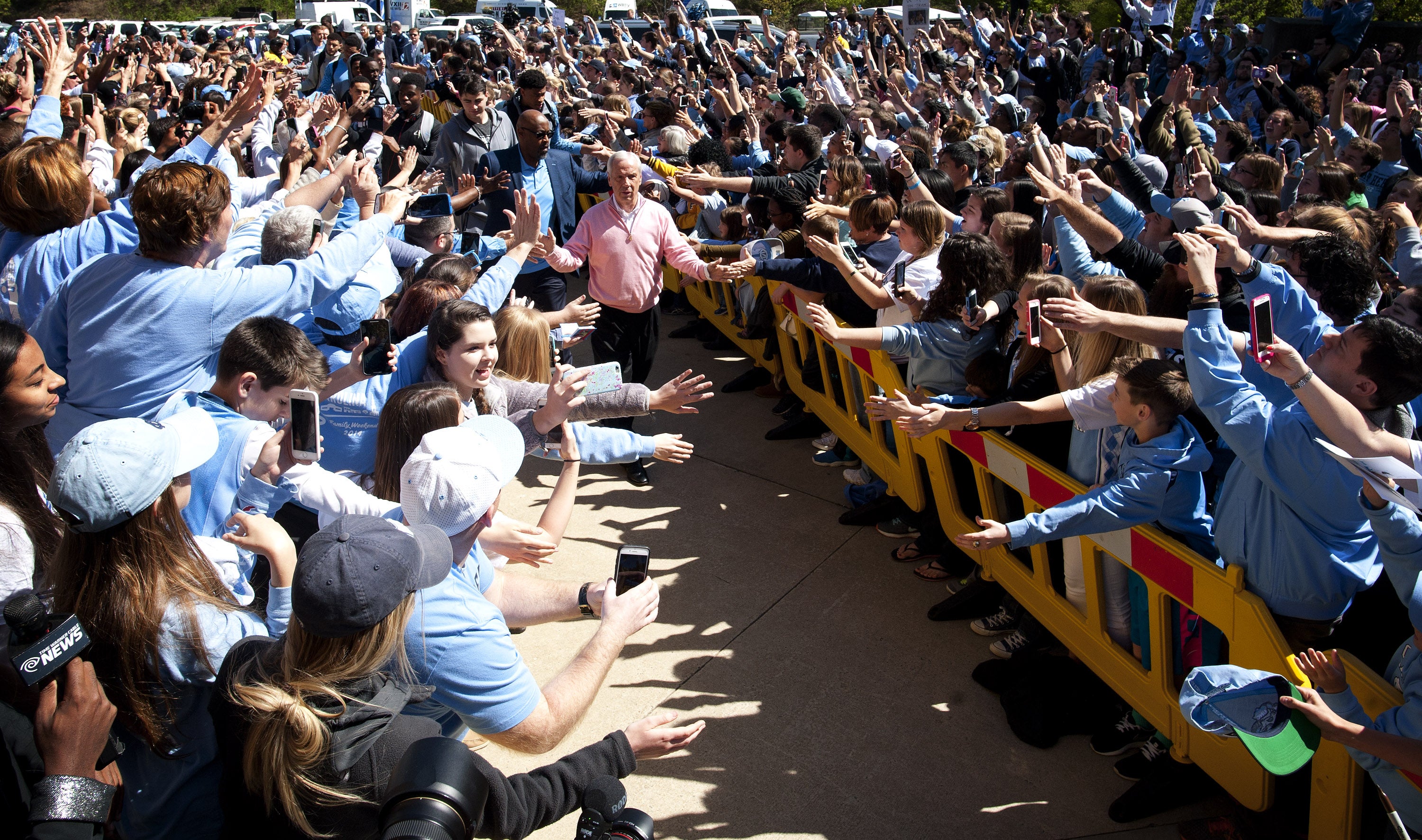 Roy Williams is greeted by fans.