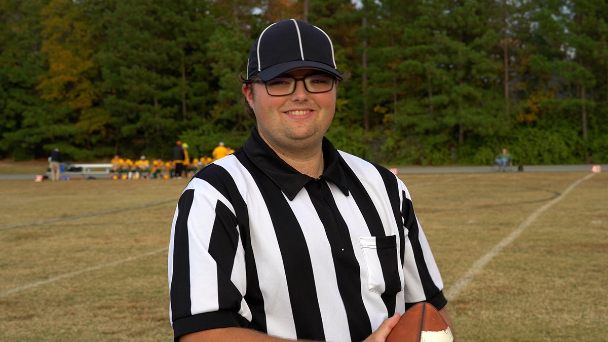 Jay Garner in a referee uniform.