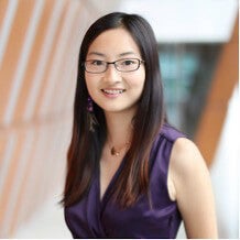Zhao smiles at camera