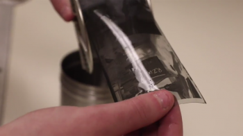 Student develops film.