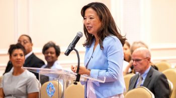 Jessica Lee speaks at podium