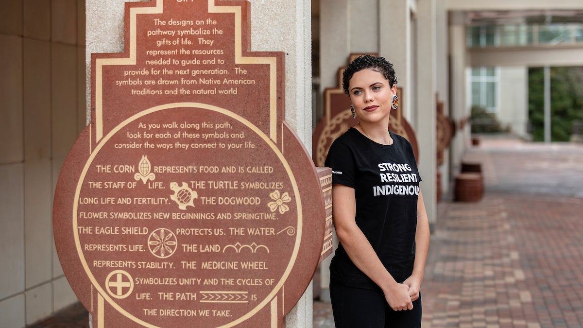 Gabrielle James stands outside the Student Union.