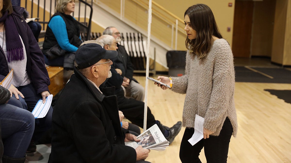 Vanessa Schoning interviews a man.