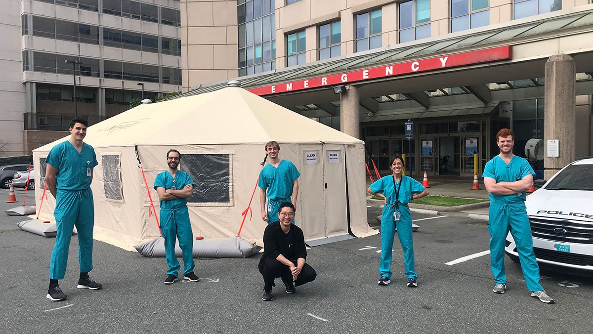 Students stand outside UNC Hospital.
