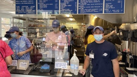 Alex Brandwein stands in Brandwein's Bagels.