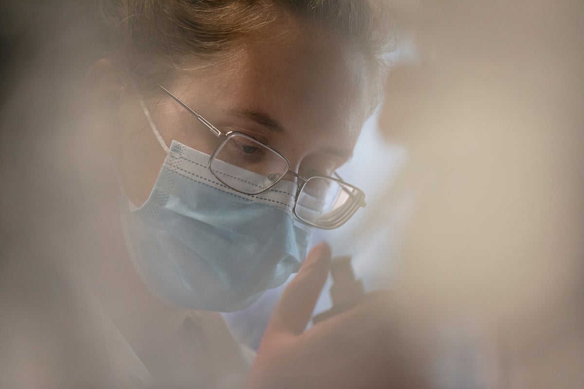 A researcher working in a lab.
