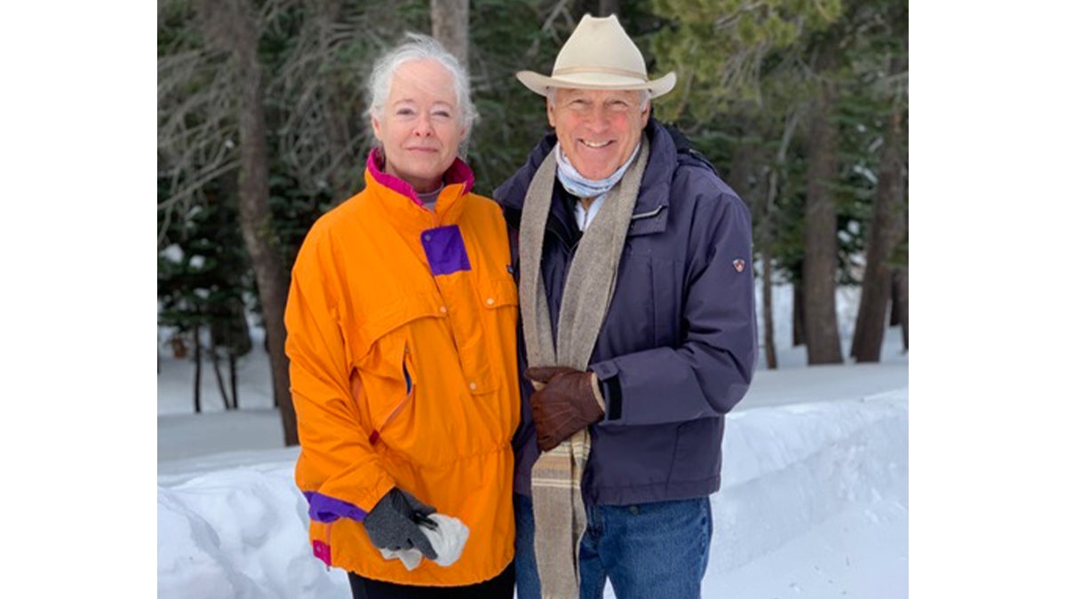 Nancy and Doug Abbey in the woods.