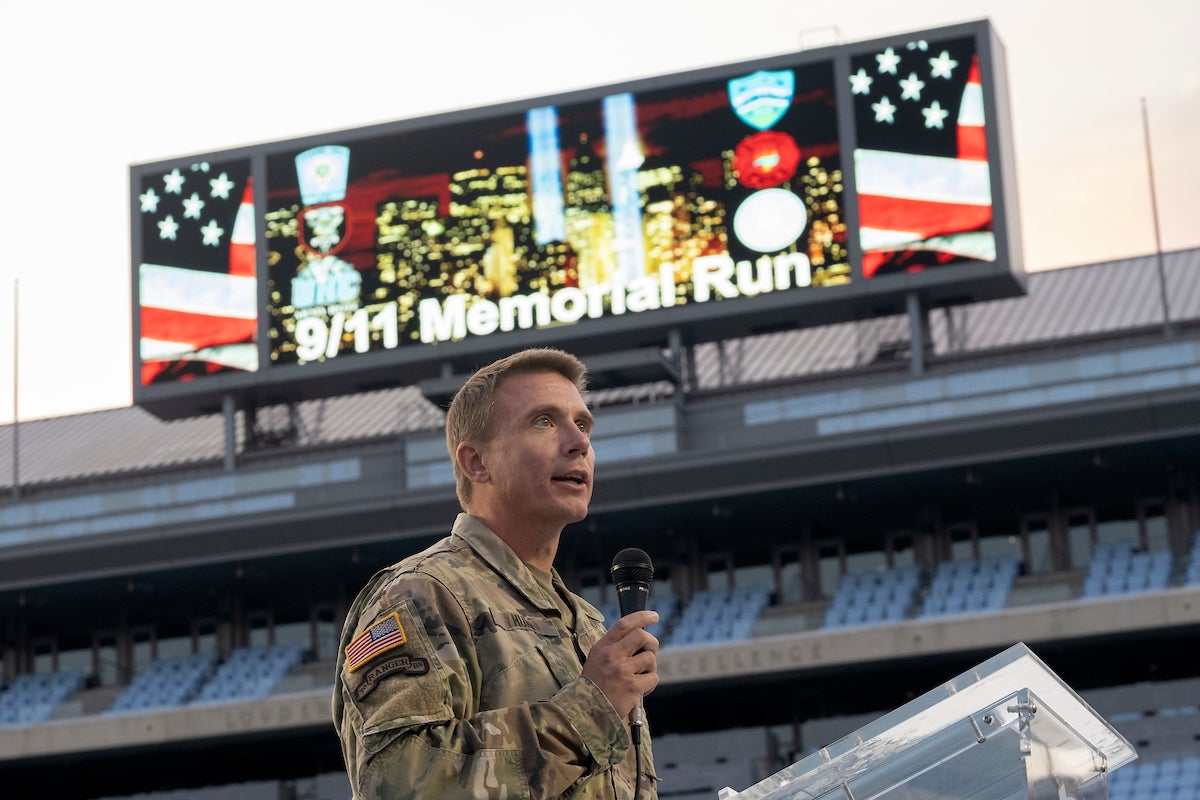 Lt. Col. Dan Hurd speaking at the podium