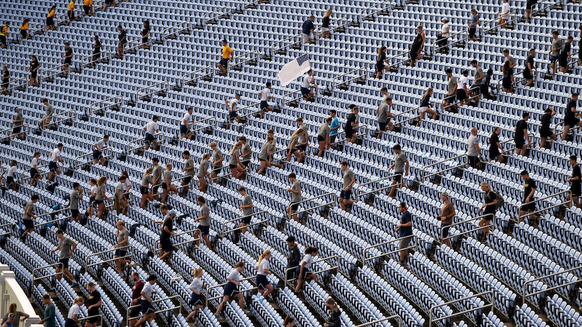 Students run stairs.