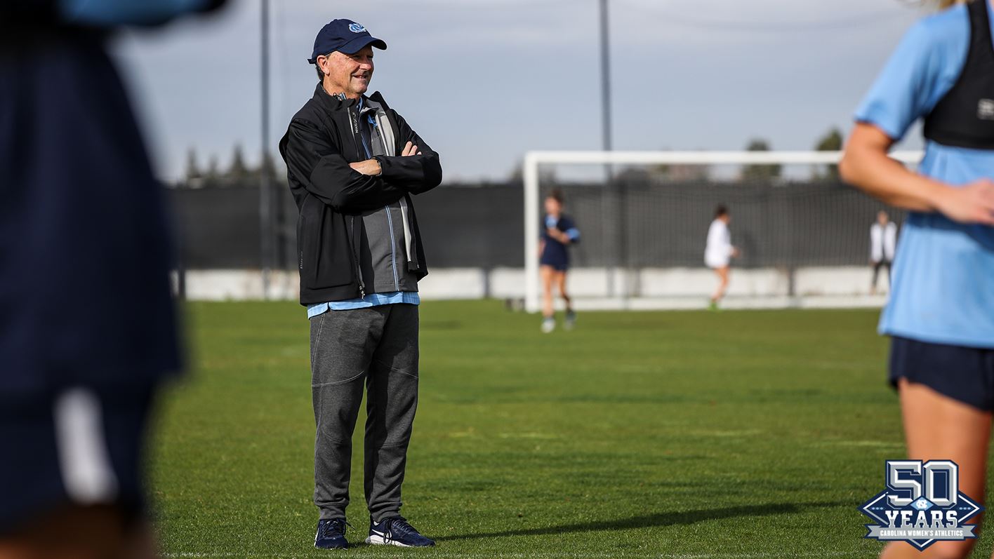 Anson Dorrance on the field.