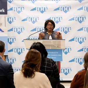 Anita Brown-Graham standing at the podium.