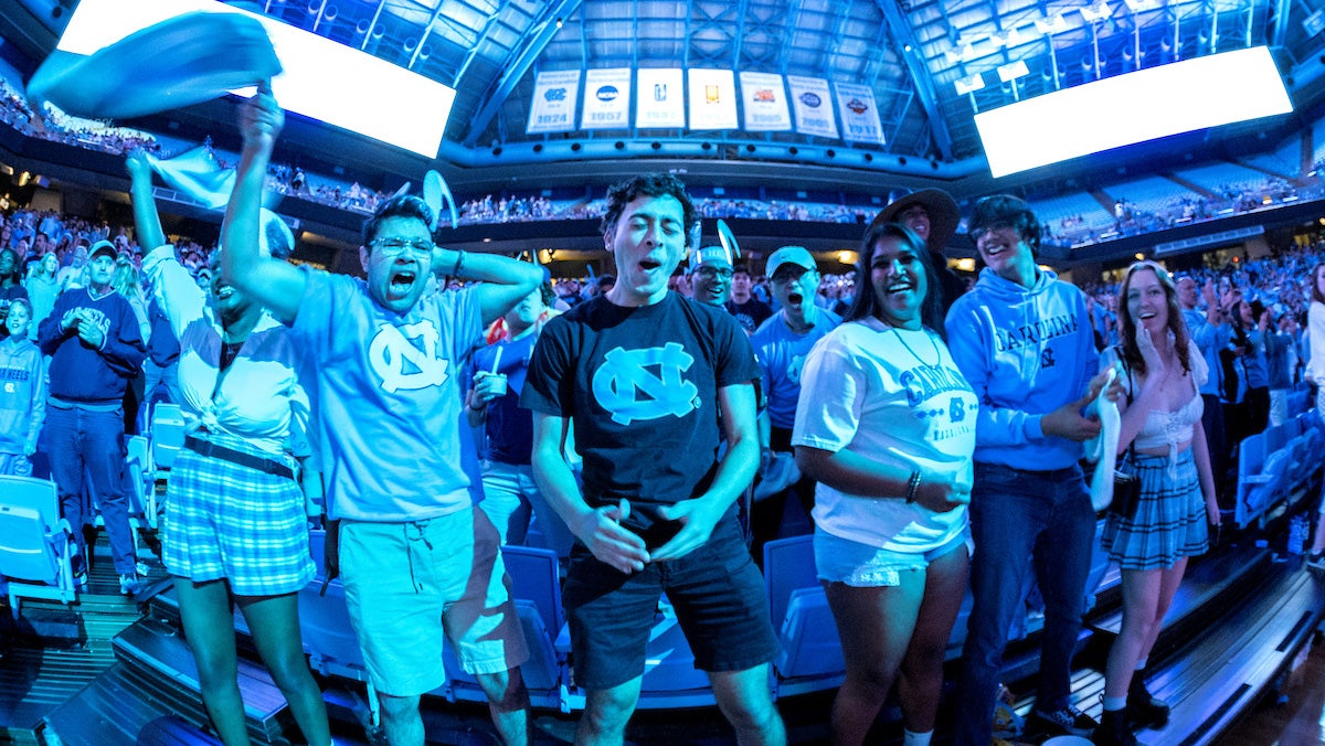 People cheeing in the Smith CEnter