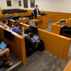 Students practicing in the courtroom.