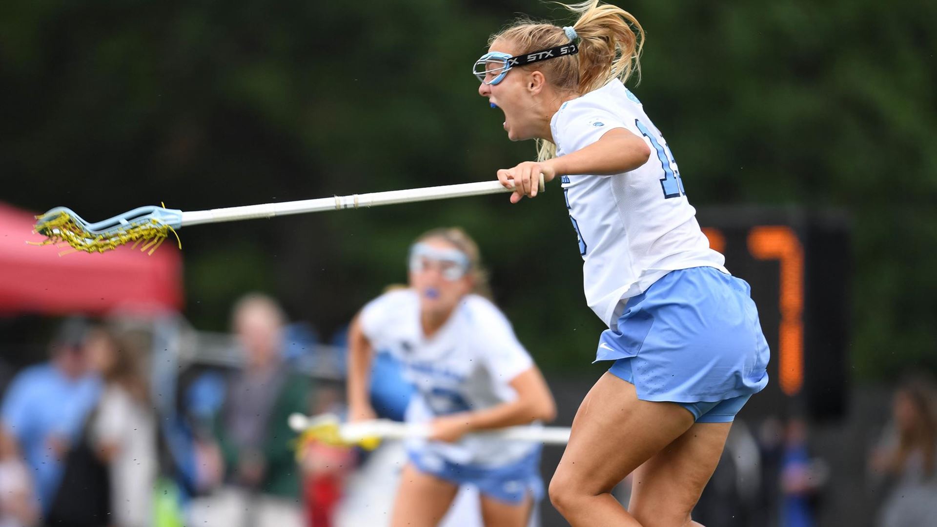 A lacrosse player celebrating
