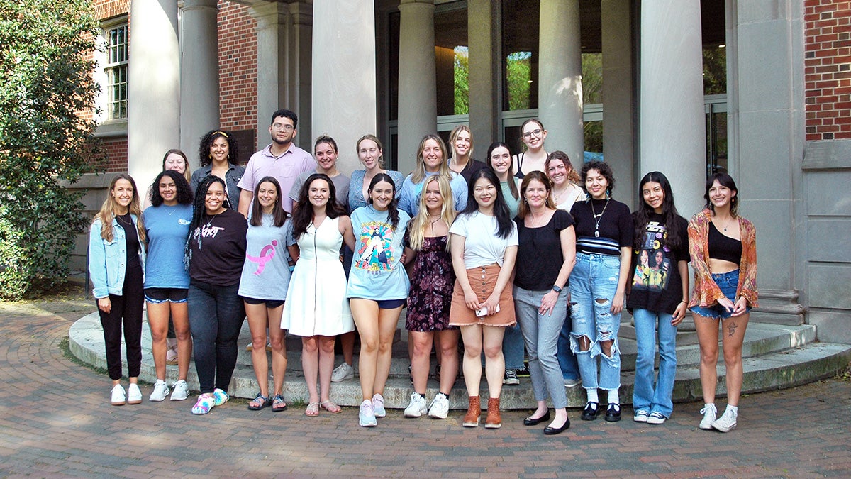 Students standing in front of the School of Ed.