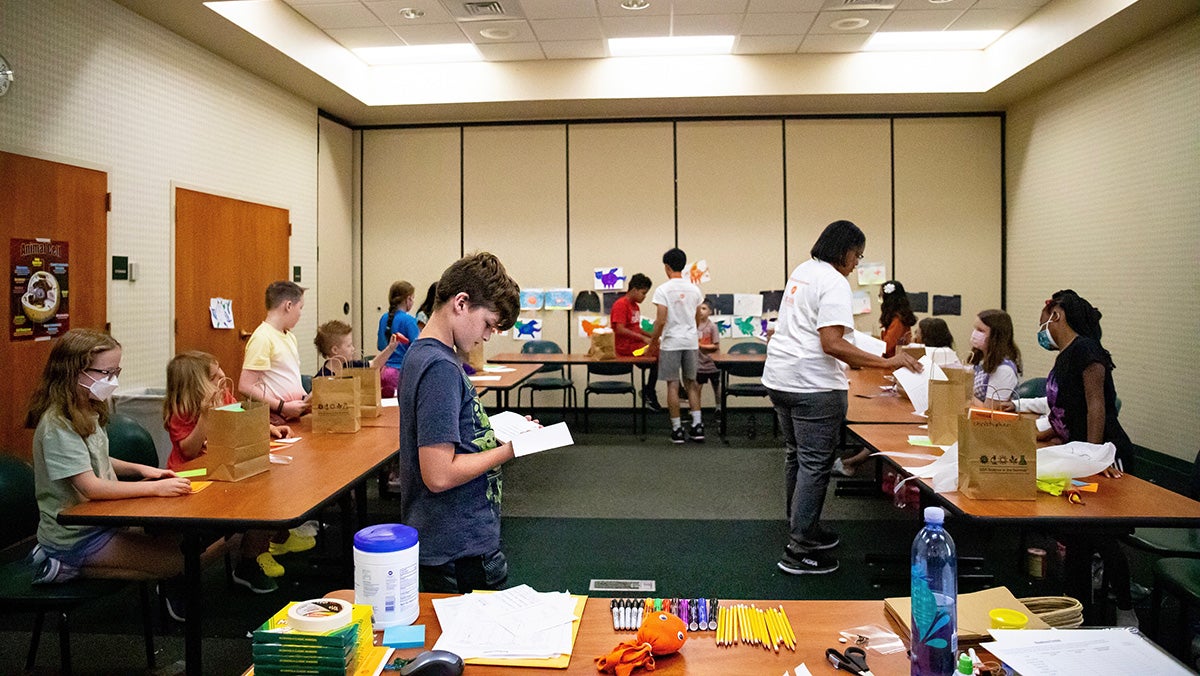 Students work on projects in a classroom.