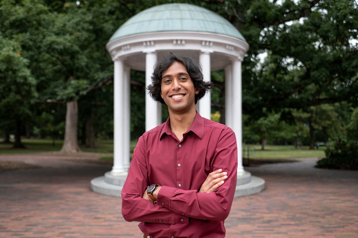 Varun Potlapalli standing by the Old Well.