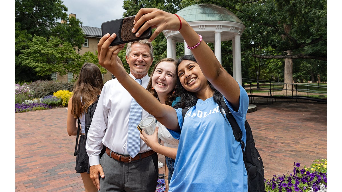 People pose for a selfie
