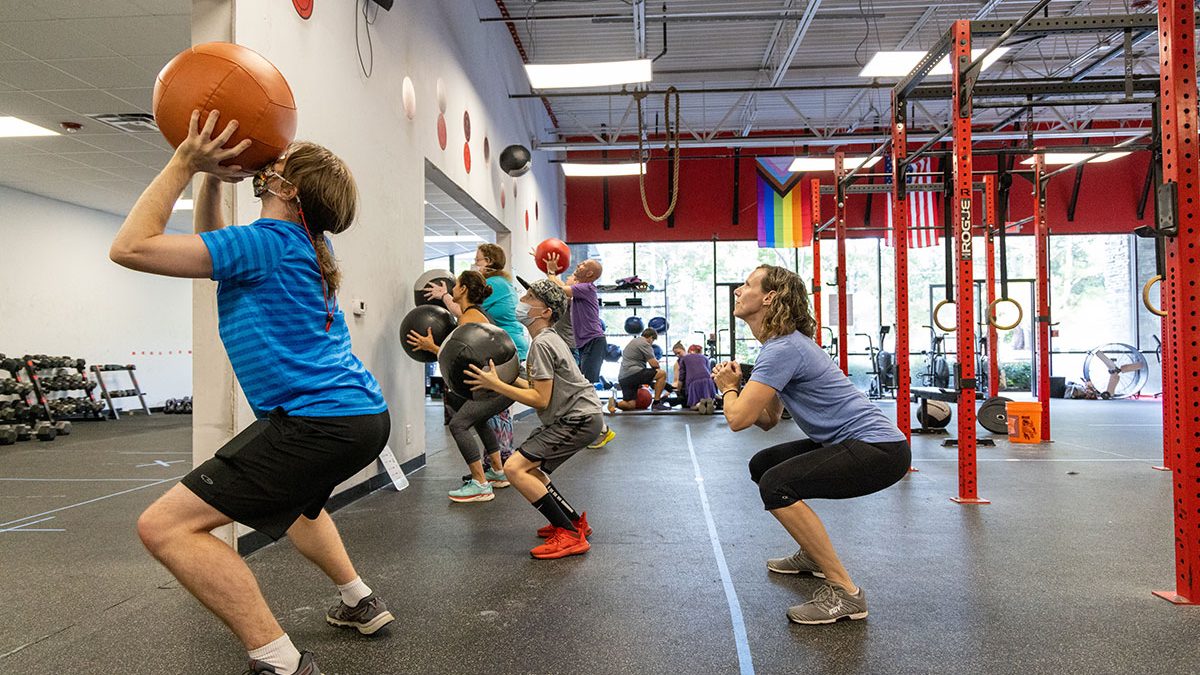 People exercising in a gym.
