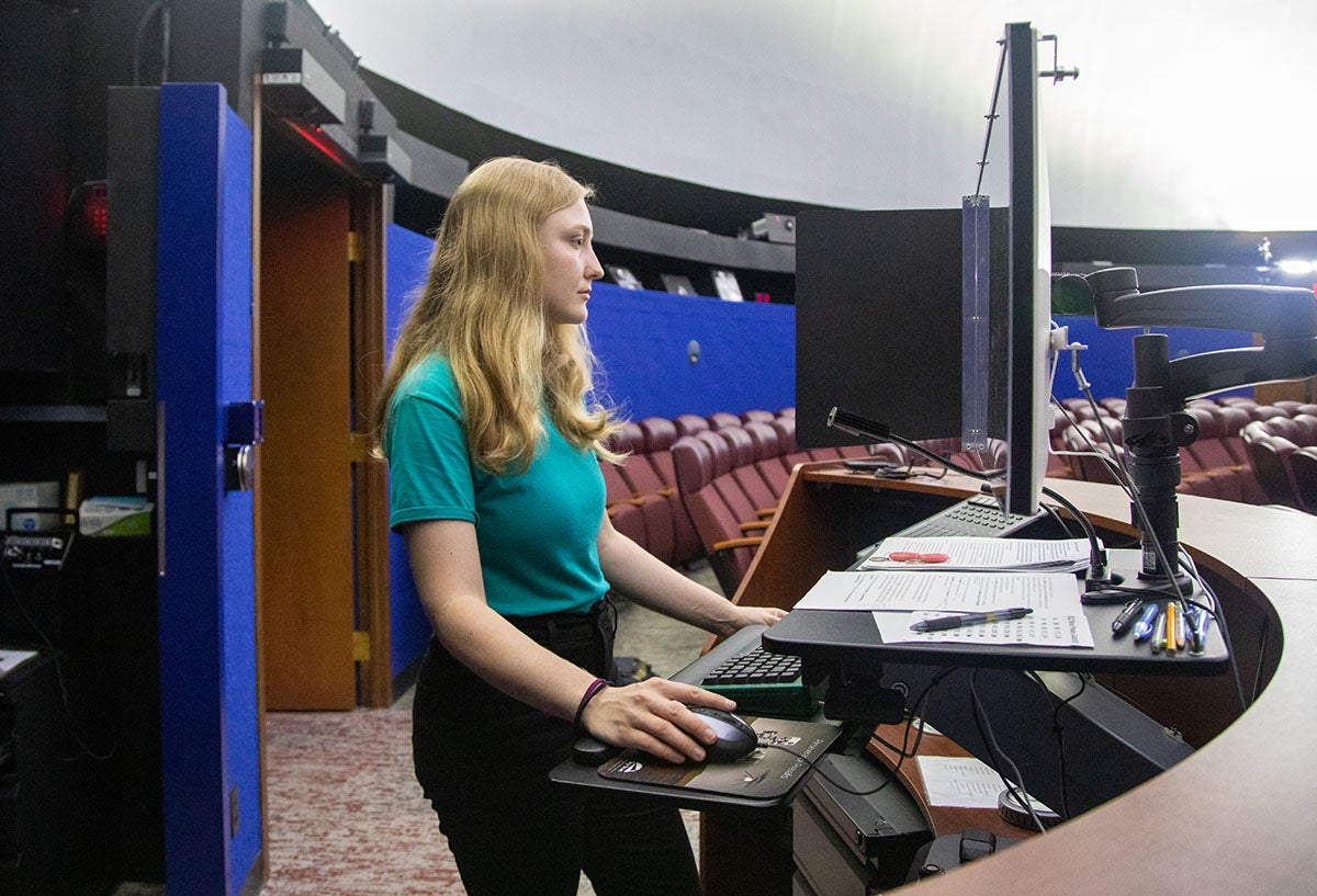 Sophie Mallinson working at a computer.