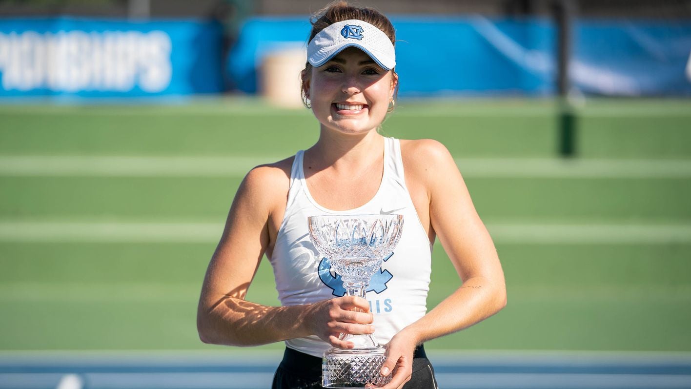 Fiona Crawley holding a trophy.