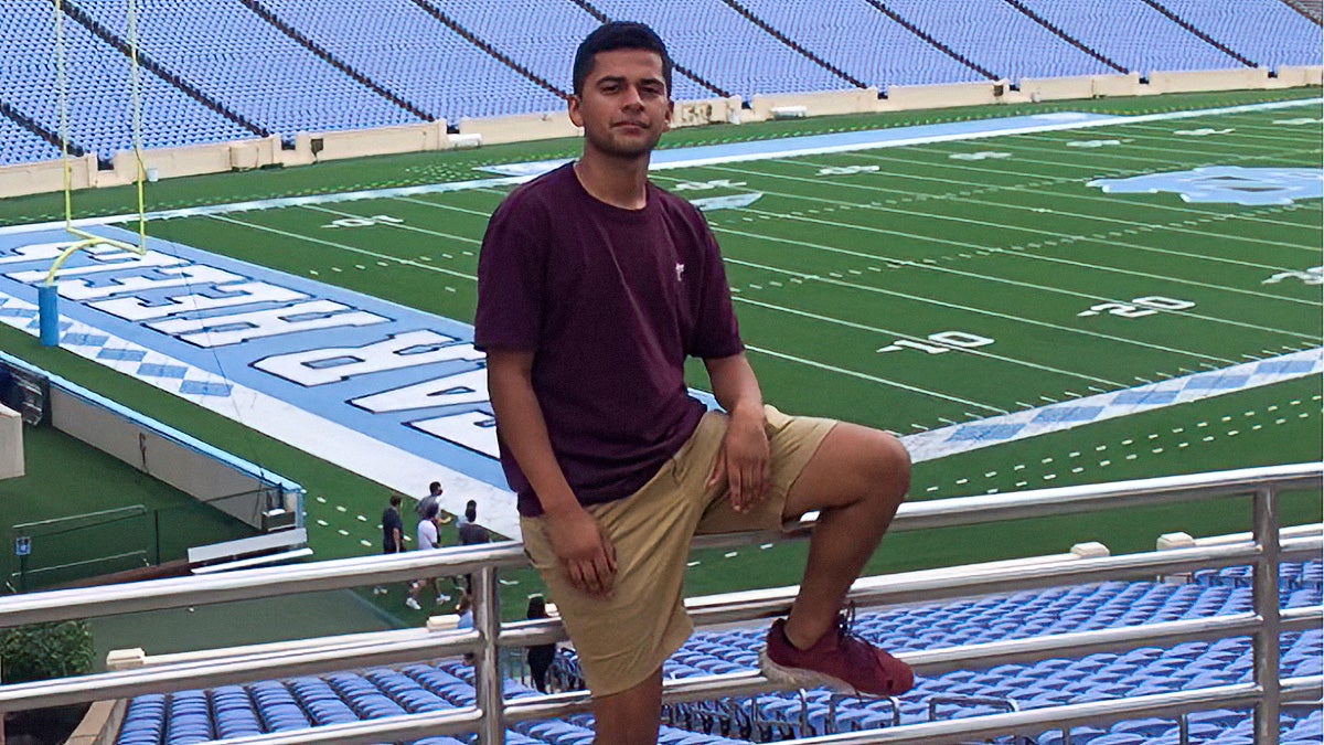 Gerson standing outside at Kenan Stadium.
