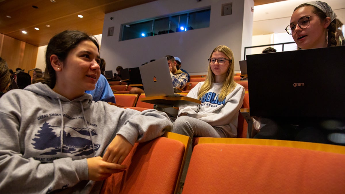 Students sitting in a classroom.