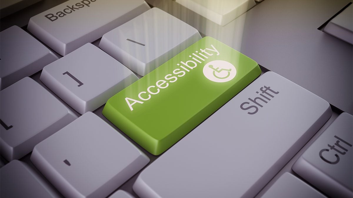 A green button on a keyboard that reads,