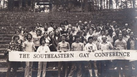 People holding a sign.