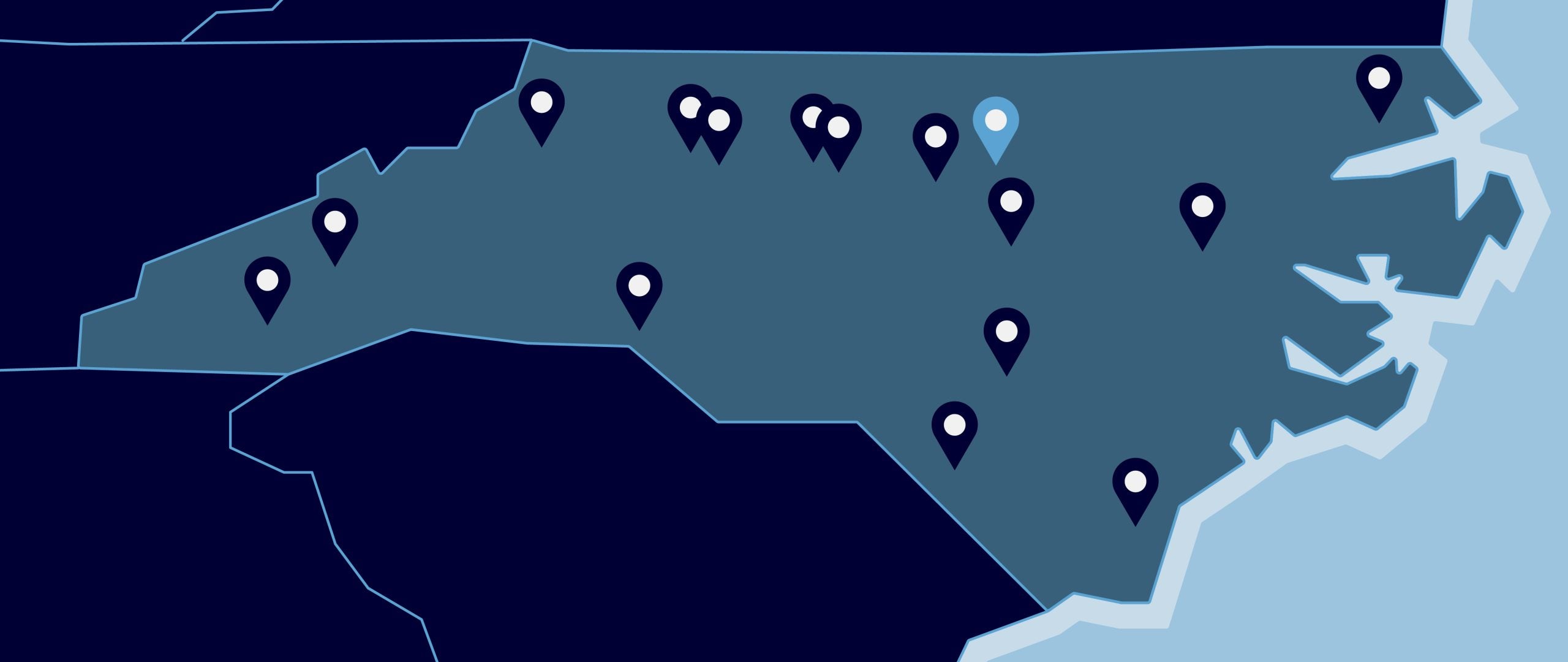 Map of North Carolina with dots on UNC System schools