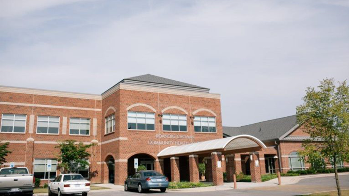 Exterior building image of Roanoke Chowan Community Health Center underneath cloudy sky.