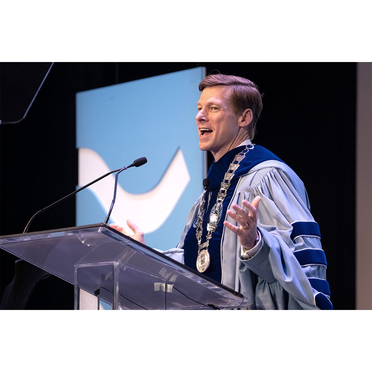 Chancellor Lee H. Roberts giving a speech during his installation on the stage at Memorial Hall on the campus of UNC-Chapel Hill.
