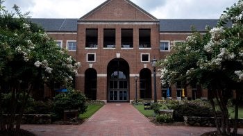 Exterior photo of Kenan Flagler Business School during the day.