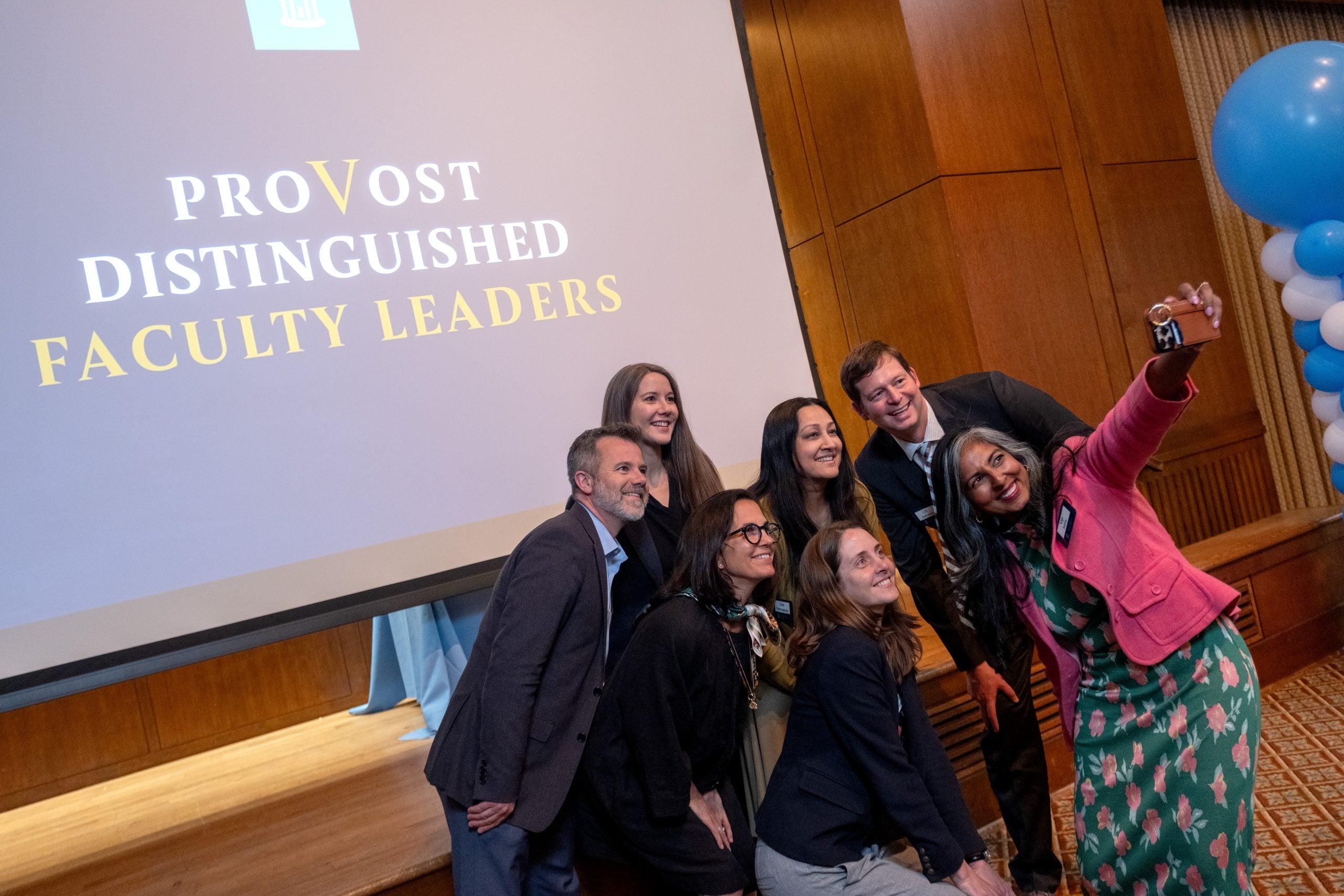 The 2025-27 cohort of the Provost Distinguished Faculty Leaders Program takes a selfie after the Spring Symposium
