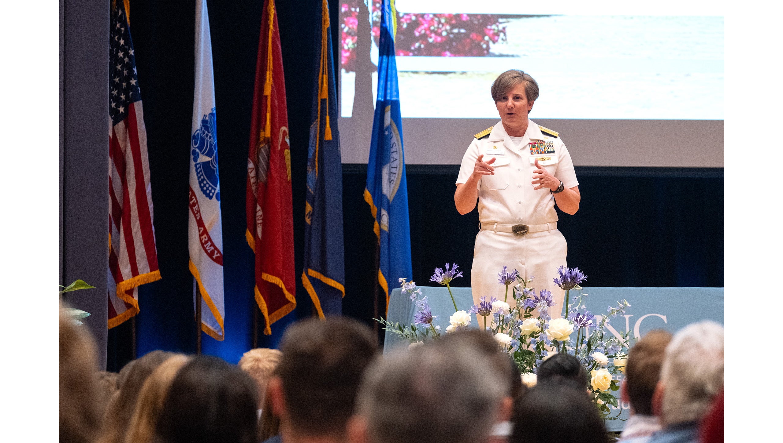 Rear Admiral Kristin Acquavella ’93 speaks at Red, White and Blue Graduation