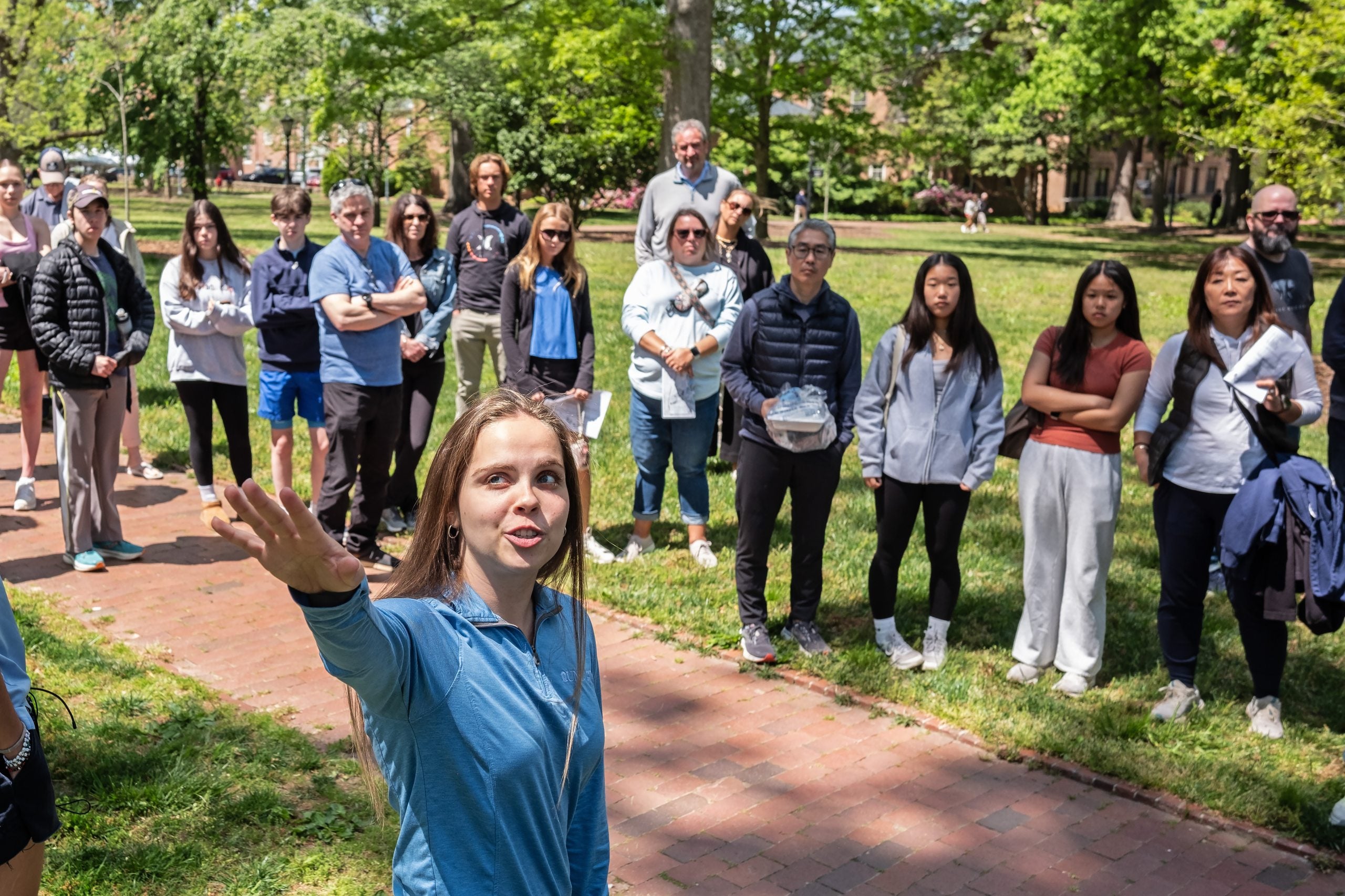 Gillian Kepley guiding a tour on UNC-Chapel Hill's Campus