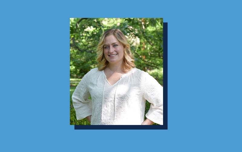 Portrait of Sarah Blanton atop a Carolina Blue background.