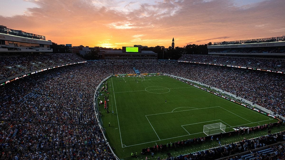 Kenan Stadium at sunset during the Wrexham-Chelsea soccer game in 2023.